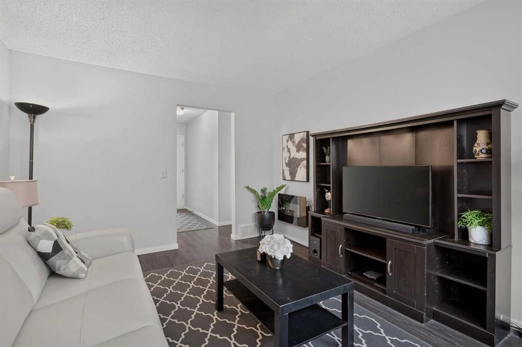 3881 Fonda Way Se, Calgary, AB - Indoor Photo Showing Living Room