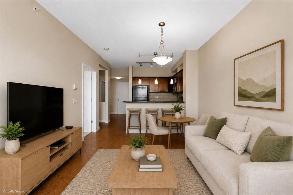 407-201 Sunset Drive, Cochrane, AB - Indoor Photo Showing Living Room