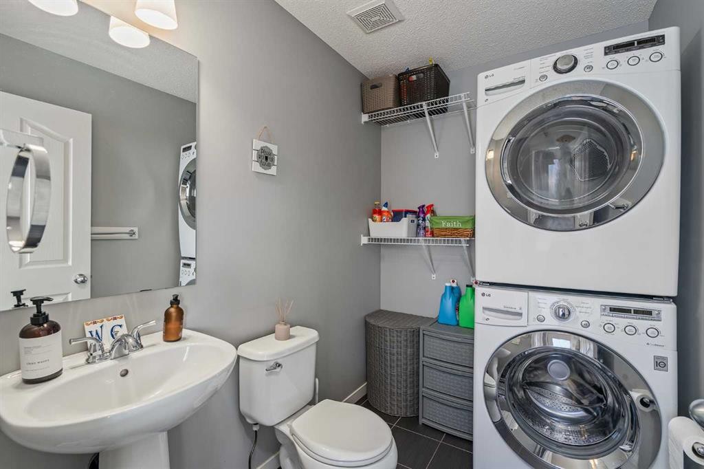 191 Cranford Crescent Se, Calgary, AB - Indoor Photo Showing Laundry Room