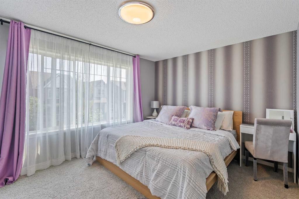 191 Cranford Crescent Se, Calgary, AB - Indoor Photo Showing Bedroom