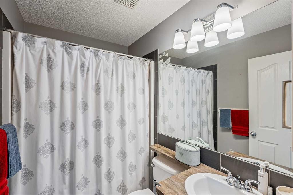 191 Cranford Crescent Se, Calgary, AB - Indoor Photo Showing Bathroom