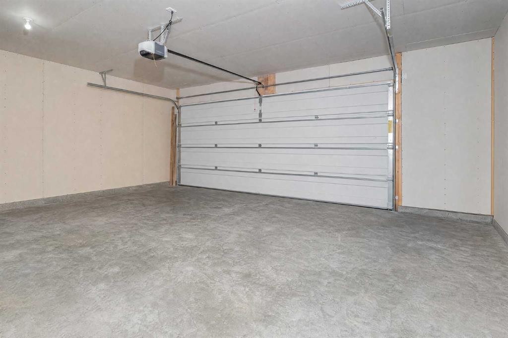 191 Cranford Crescent Se, Calgary, AB - Indoor Photo Showing Garage