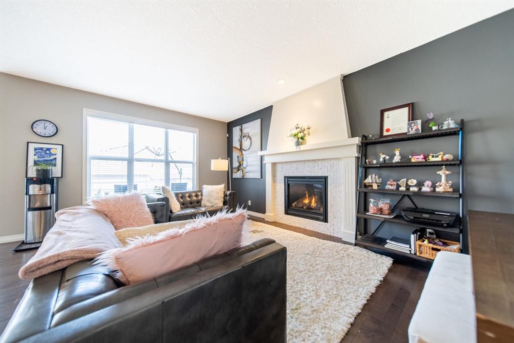 98 Mahogany Passage Se, Calgary, AB - Indoor Photo Showing Living Room With Fireplace