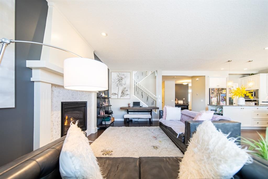 98 Mahogany Passage Se, Calgary, AB - Indoor Photo Showing Living Room With Fireplace