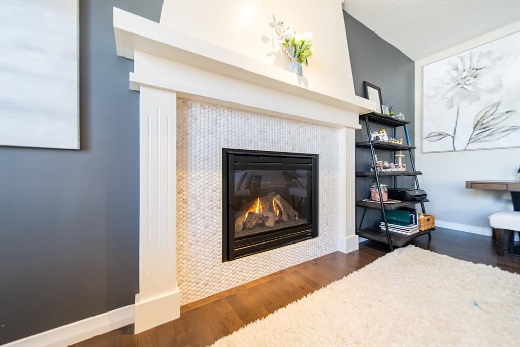 98 Mahogany Passage Se, Calgary, AB - Indoor Photo Showing Living Room With Fireplace