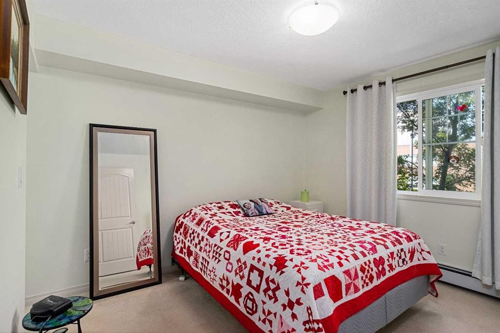 208-304 Cranberry Park Se, Calgary, AB - Indoor Photo Showing Bedroom