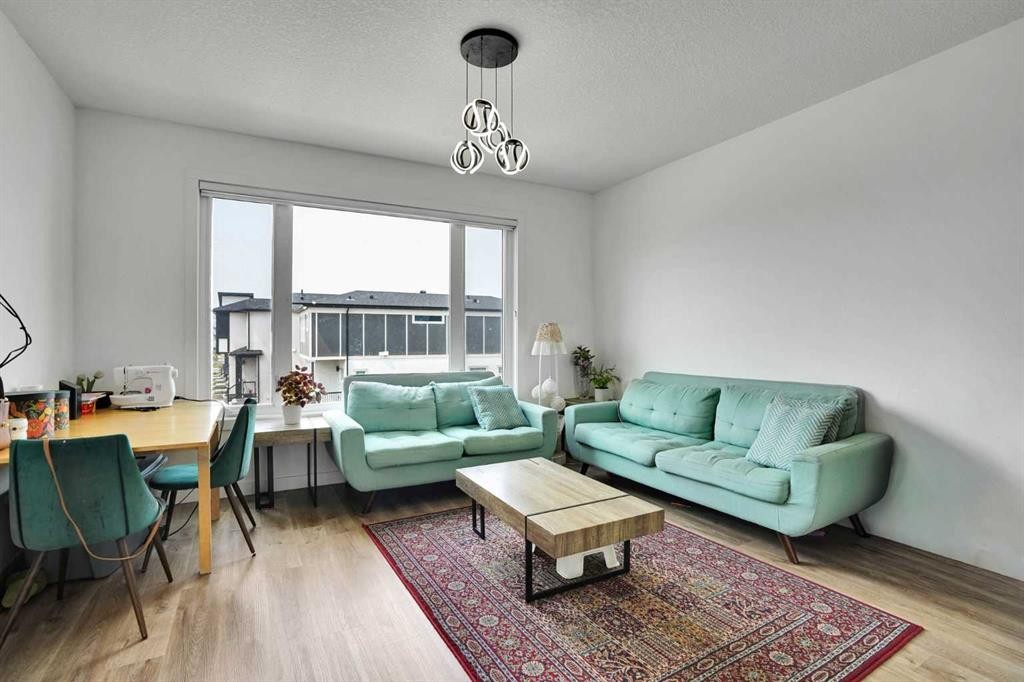 241 Saddlepeace Crescent Ne, Calgary, AB - Indoor Photo Showing Living Room