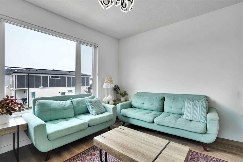 241 Saddlepeace Crescent Ne, Calgary, AB - Indoor Photo Showing Living Room