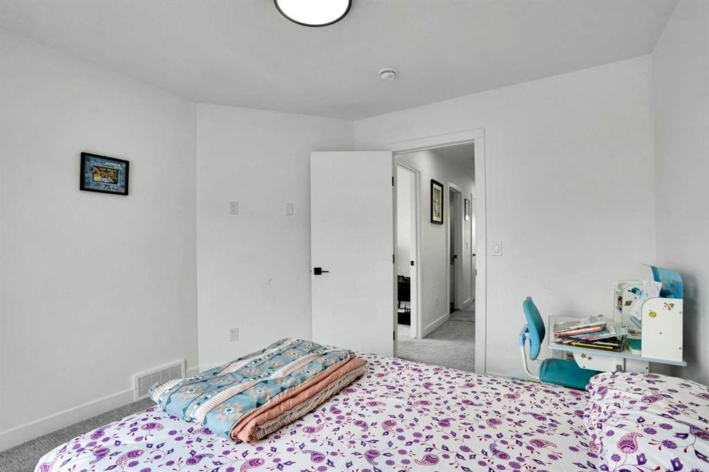 241 Saddlepeace Crescent Ne, Calgary, AB - Indoor Photo Showing Bedroom