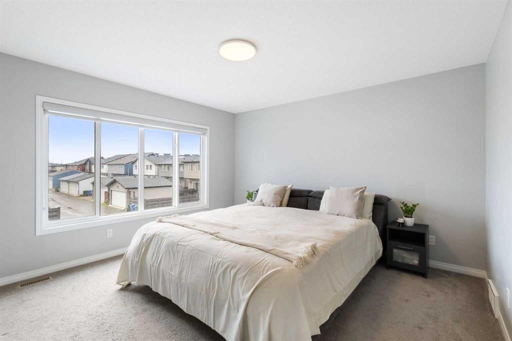28 Seton Terrace Se, Calgary, AB - Indoor Photo Showing Bedroom