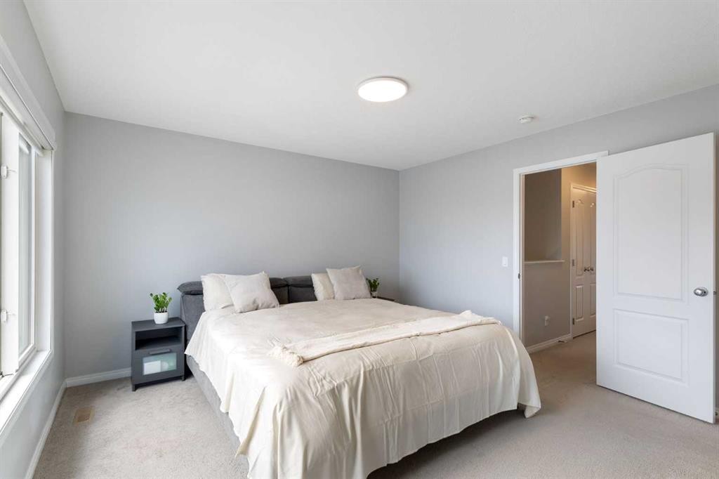 28 Seton Terrace Se, Calgary, AB - Indoor Photo Showing Bedroom