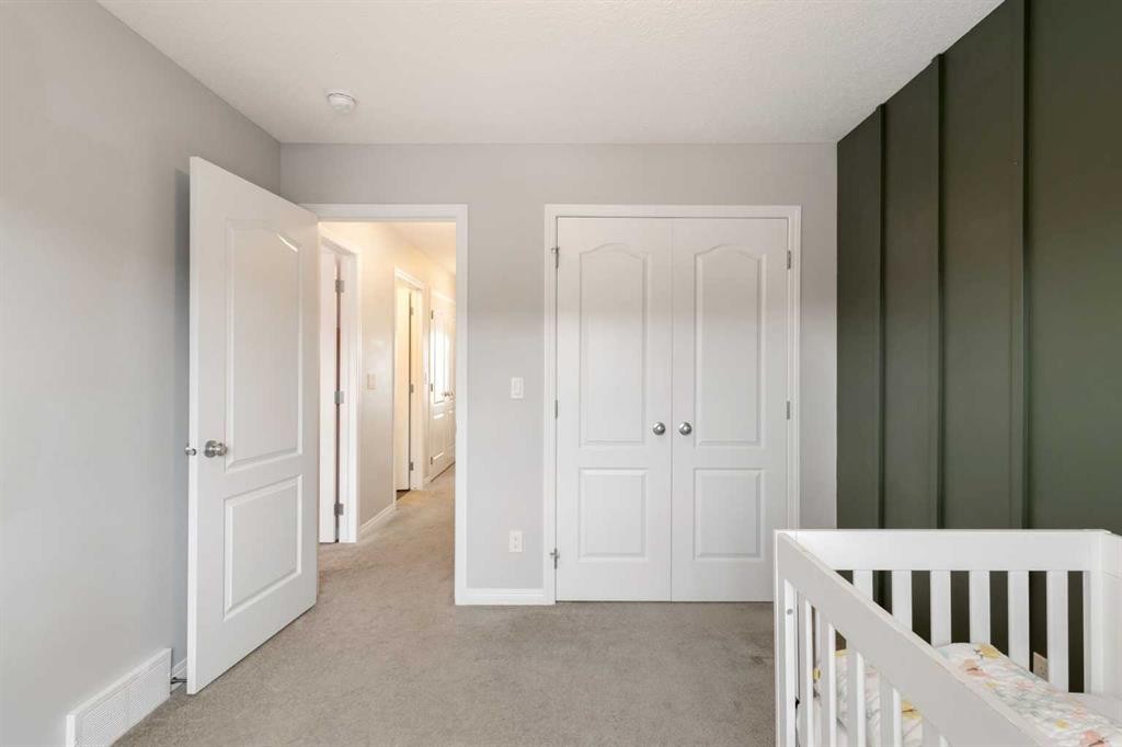 28 Seton Terrace Se, Calgary, AB - Indoor Photo Showing Bedroom