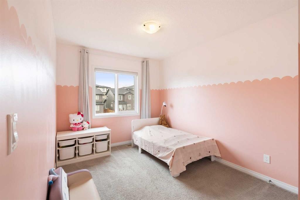 28 Seton Terrace Se, Calgary, AB - Indoor Photo Showing Bedroom