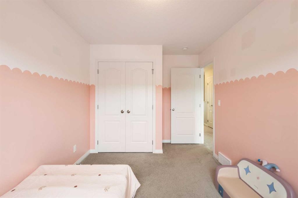 28 Seton Terrace Se, Calgary, AB - Indoor Photo Showing Bedroom