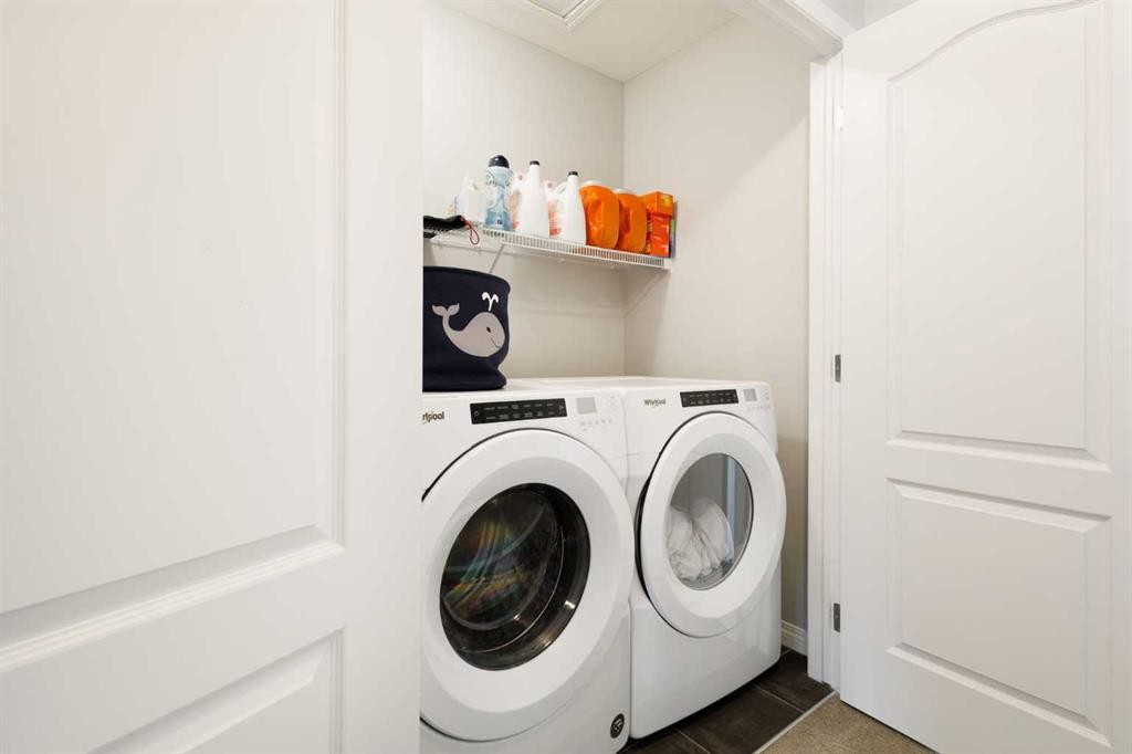 28 Seton Terrace Se, Calgary, AB - Indoor Photo Showing Laundry Room