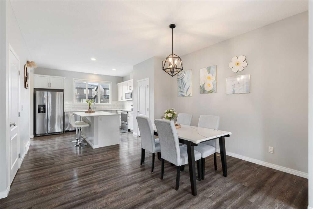 28 Seton Terrace Se, Calgary, AB - Indoor Photo Showing Dining Room