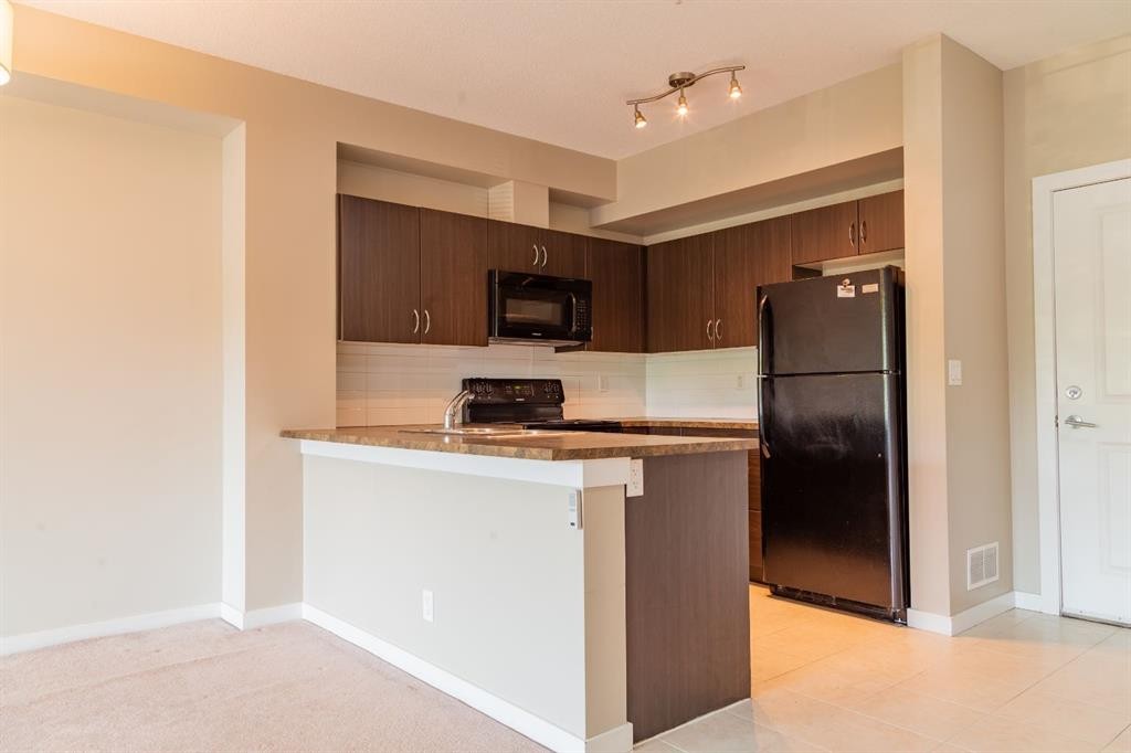 116-100 Cranfield Common Se, Calgary, AB - Indoor Photo Showing Kitchen