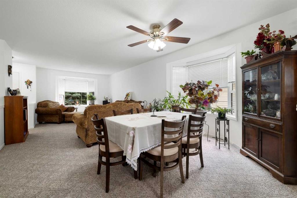 100 Dovista Court Se, Calgary, AB - Indoor Photo Showing Dining Room