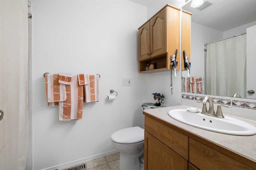 100 Dovista Court Se, Calgary, AB - Indoor Photo Showing Bathroom