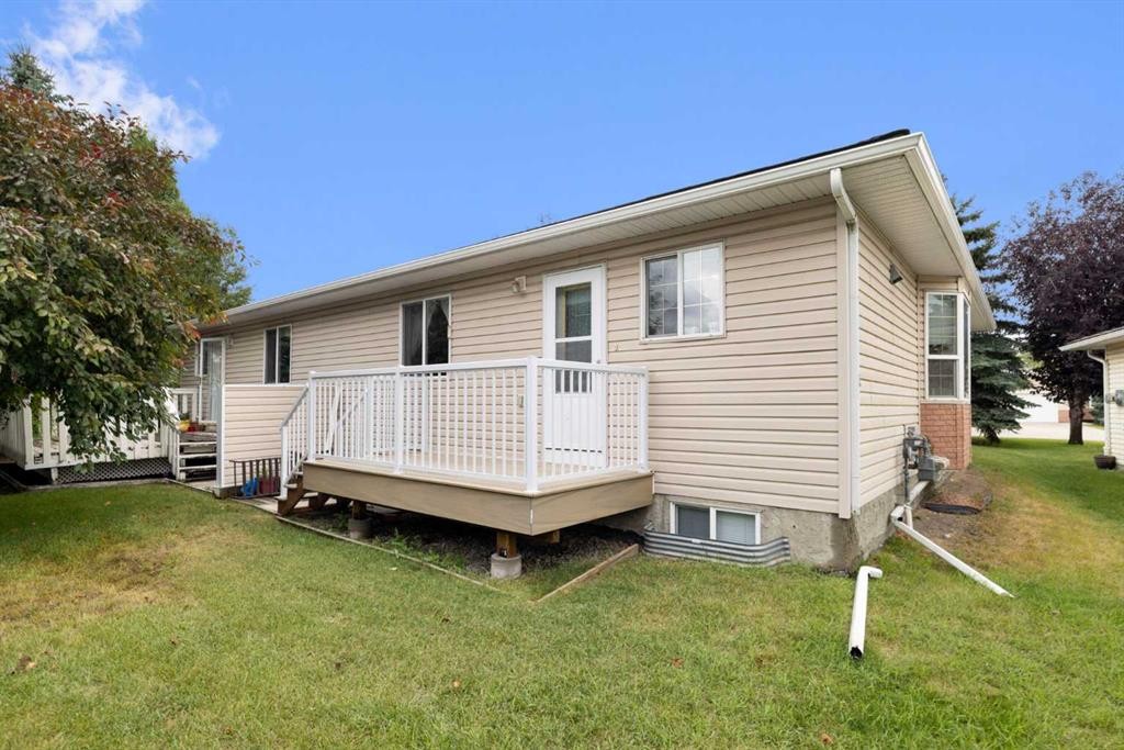 100 Dovista Court Se, Calgary, AB - Outdoor With Deck Patio Veranda With Exterior