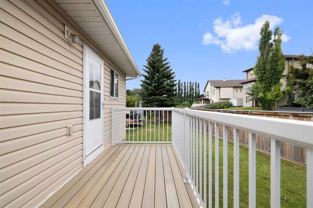 100 Dovista Court Se, Calgary, AB - Outdoor With Deck Patio Veranda With Exterior