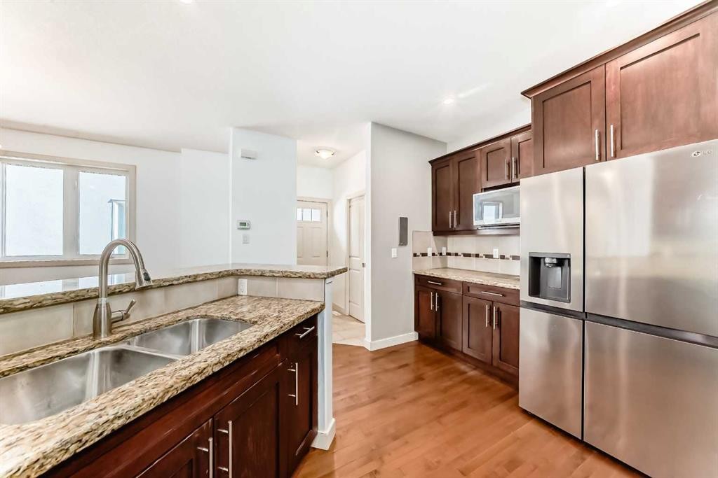 2-1921 30 Street Sw, Calgary, AB - Indoor Photo Showing Kitchen With Double Sink