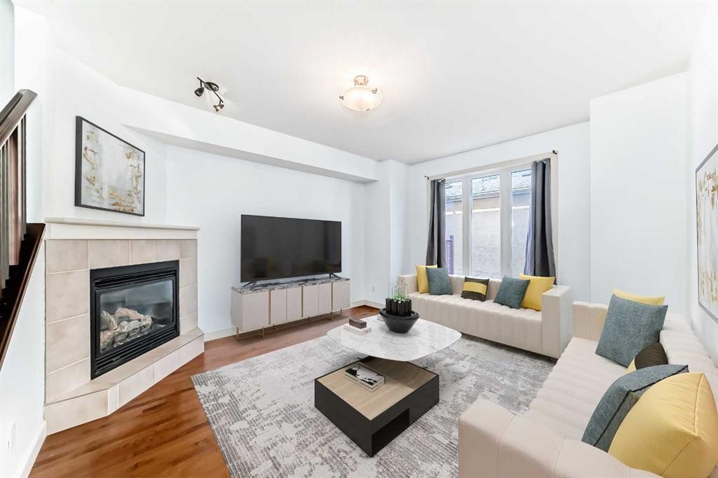 2-1921 30 Street Sw, Calgary, AB - Indoor Photo Showing Living Room With Fireplace