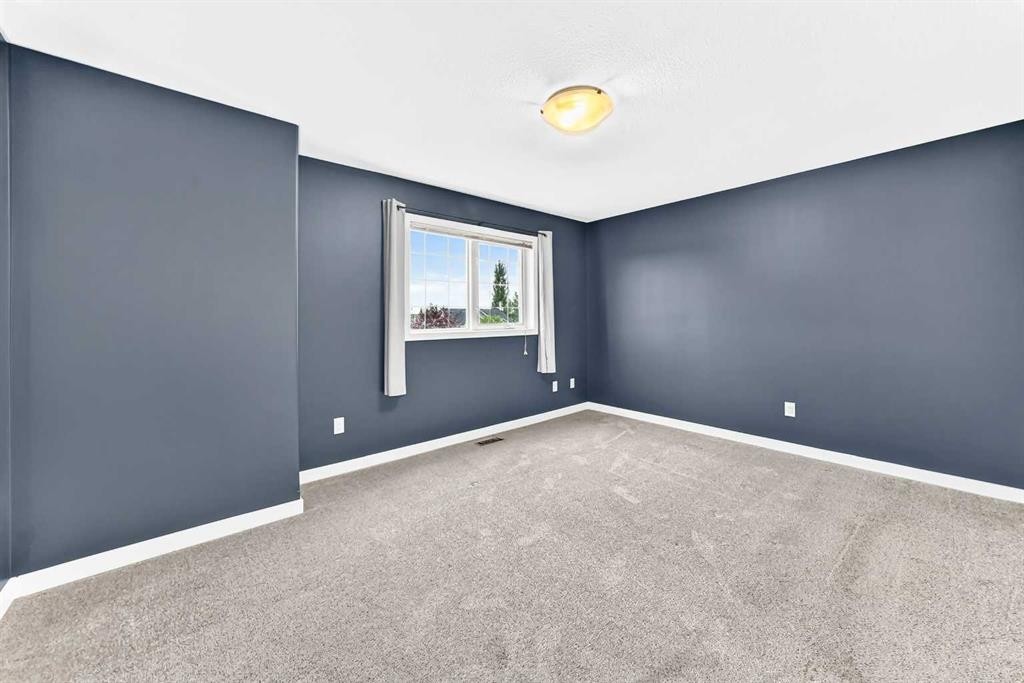 18 Julia Place, Didsbury, AB - Indoor Photo Showing Other Room