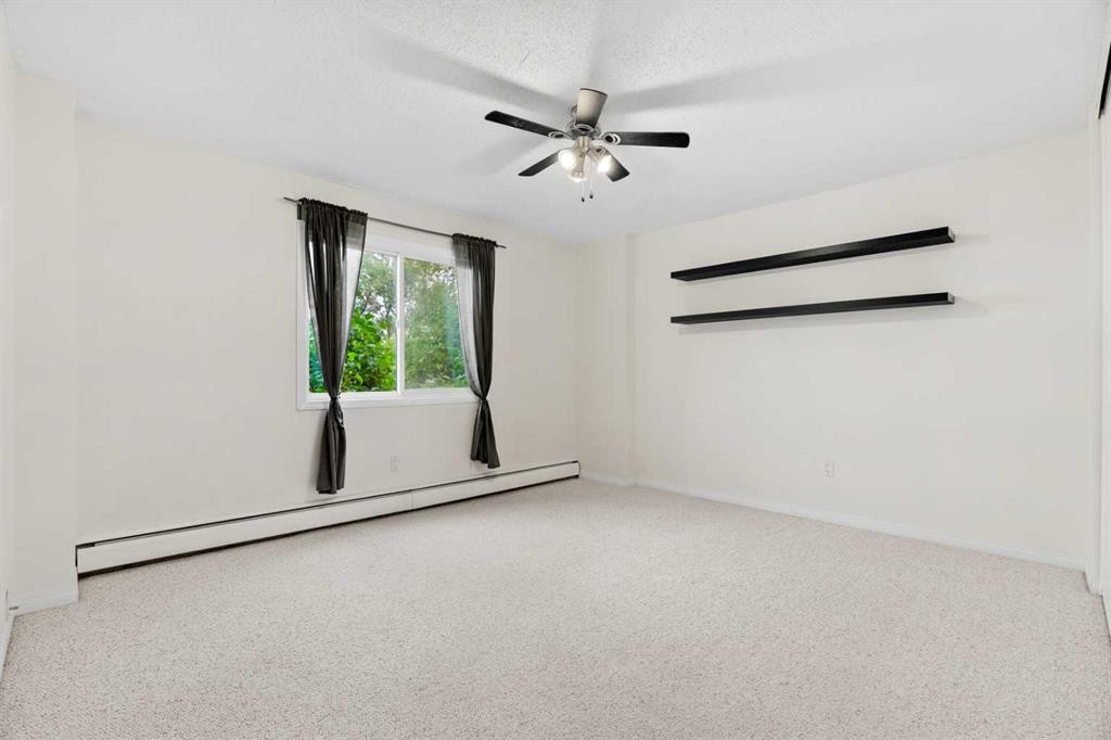 607-8948 Elbow Drive Sw, Calgary, AB - Indoor Photo Showing Other Room