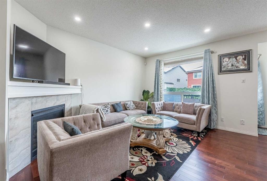 482 Skyview Ranch Way Ne, Calgary, AB - Indoor Photo Showing Living Room With Fireplace