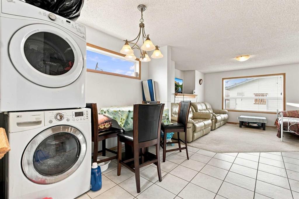 162 Taradale Drive Ne, Calgary, AB - Indoor Photo Showing Laundry Room