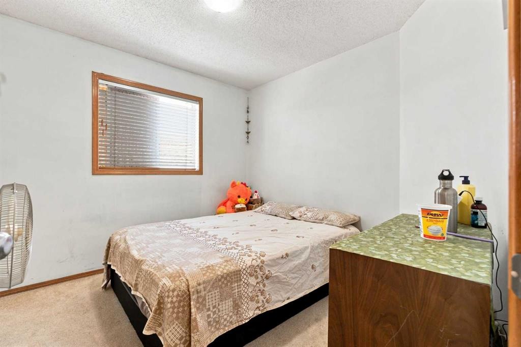 162 Taradale Drive Ne, Calgary, AB - Indoor Photo Showing Bedroom