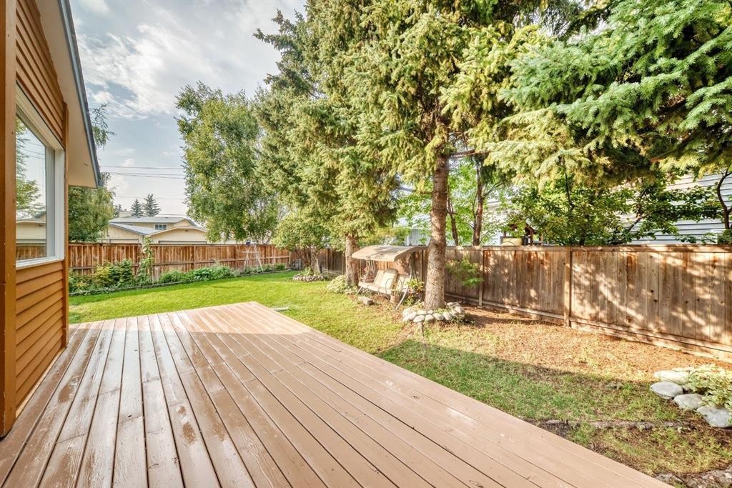 39 Woodfield Crescent Sw, Calgary, AB - Outdoor With Deck Patio Veranda