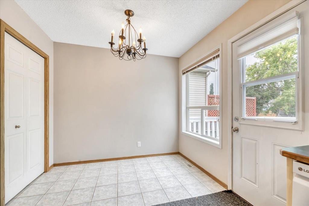 131 Hidden Way Nw, Calgary, AB - Indoor Photo Showing Other Room