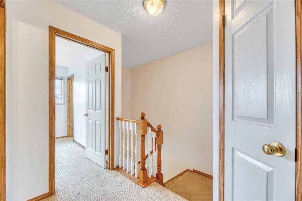 131 Hidden Way Nw, Calgary, AB - Indoor Photo Showing Other Room