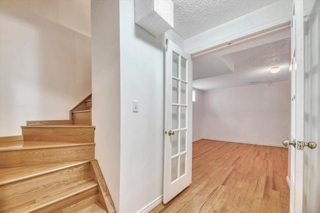 131 Hidden Way Nw, Calgary, AB - Indoor Photo Showing Other Room