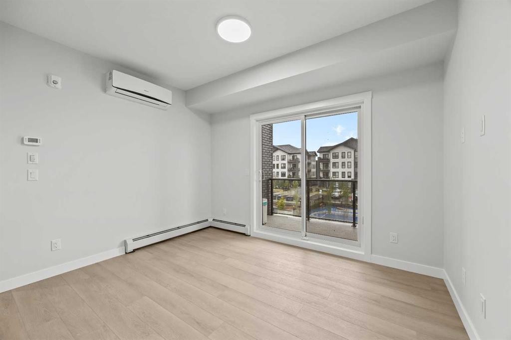 3301-100 Banister Drive, Okotoks, AB - Indoor Photo Showing Other Room