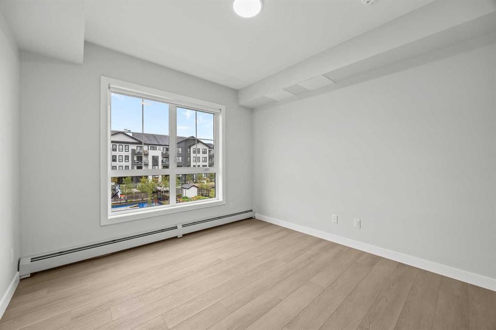 3301-100 Banister Drive, Okotoks, AB - Indoor Photo Showing Other Room