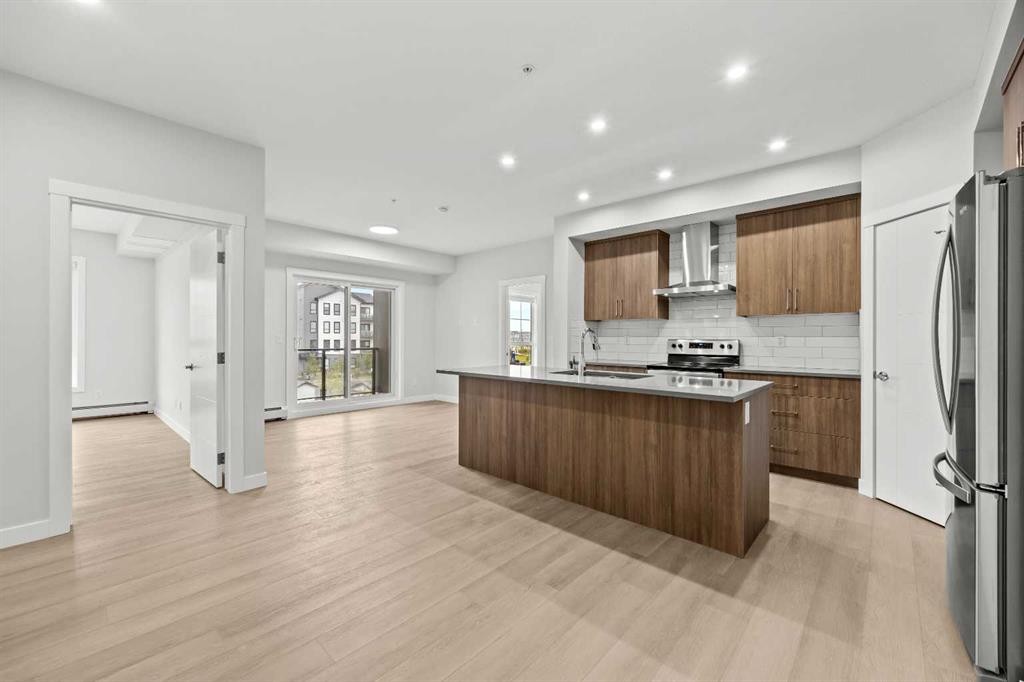 3301-100 Banister Drive, Okotoks, AB - Indoor Photo Showing Kitchen With Stainless Steel Kitchen With Upgraded Kitchen