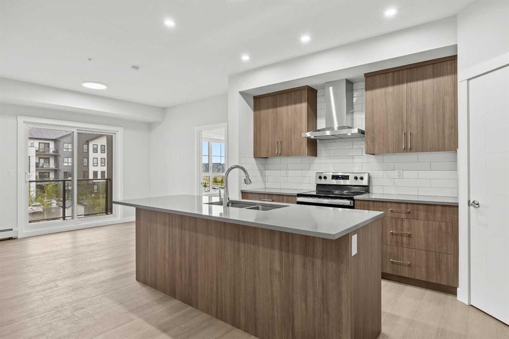 3301-100 Banister Drive, Okotoks, AB - Indoor Photo Showing Kitchen With Double Sink With Upgraded Kitchen