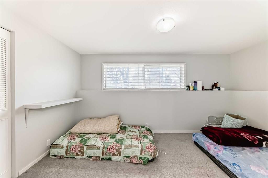6840 4 Avenue Ne, Calgary, AB - Indoor Photo Showing Bedroom
