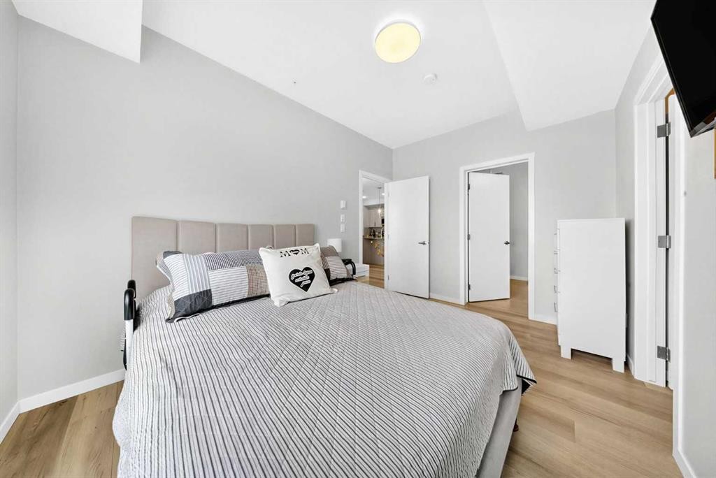 1211-220 Seton Grove Se, Calgary, AB - Indoor Photo Showing Bedroom