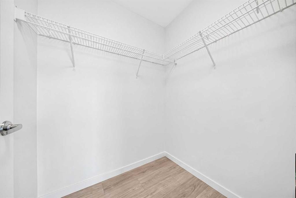 1211-220 Seton Grove Se, Calgary, AB - Indoor With Storage