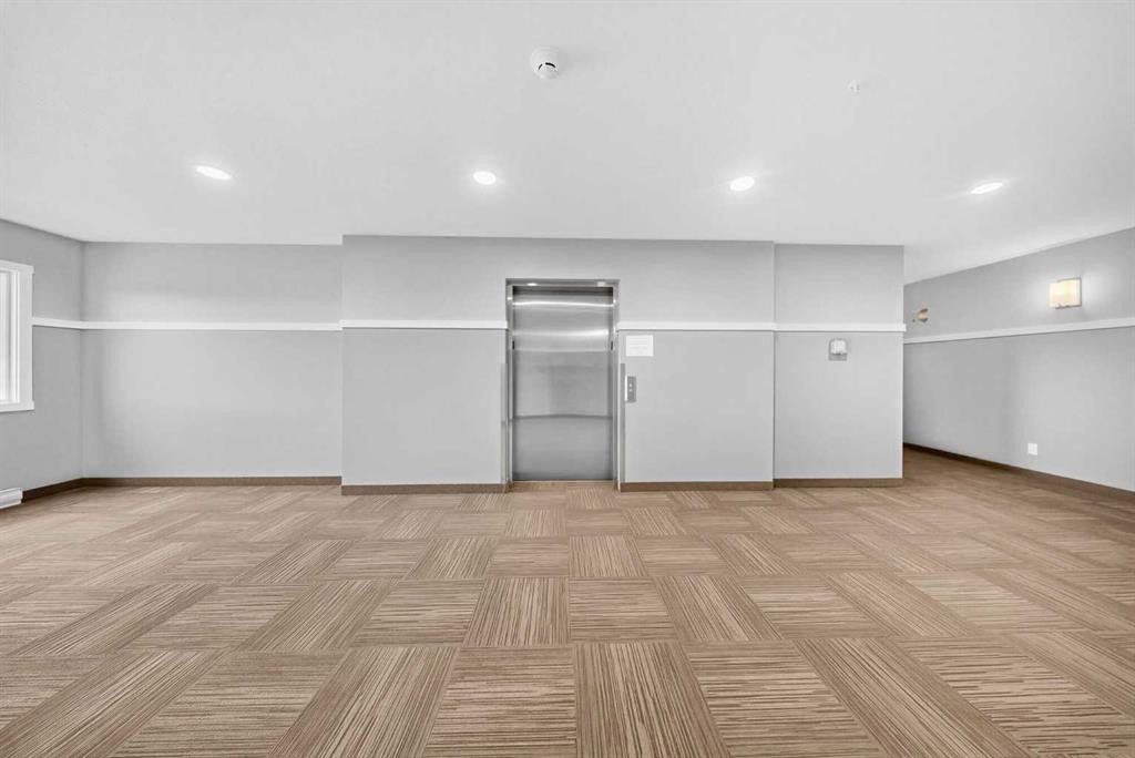 1211-220 Seton Grove Se, Calgary, AB - Indoor Photo Showing Other Room