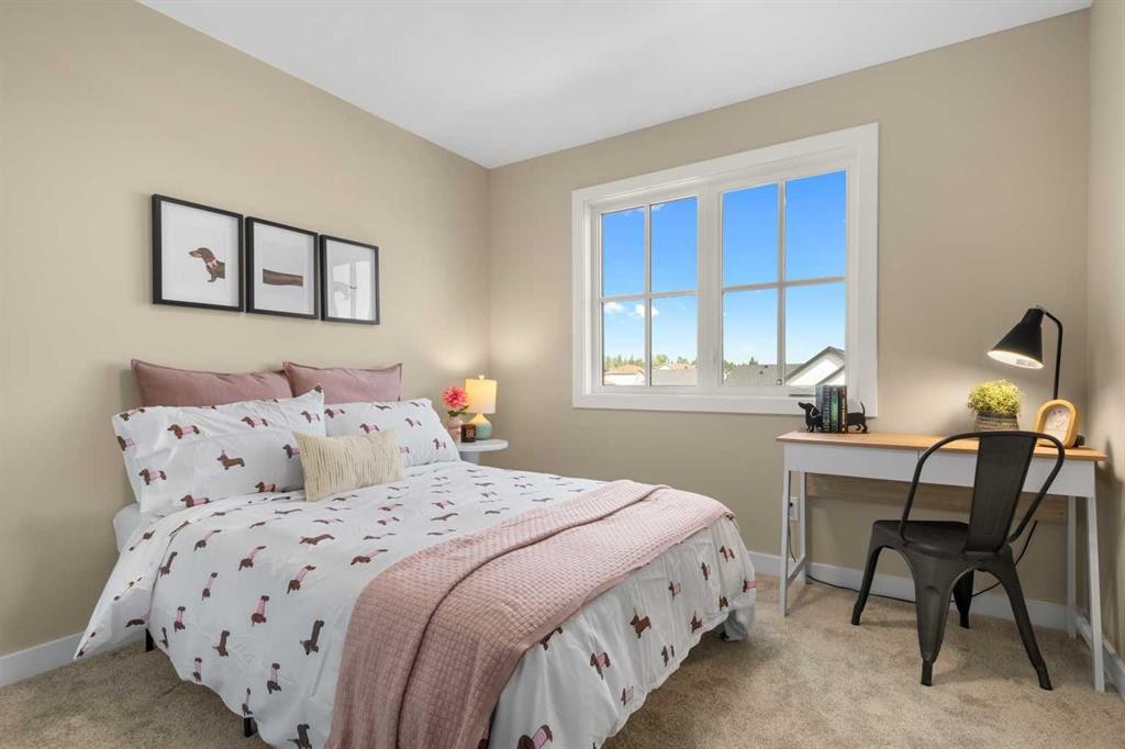 329 Flare Avenue Sw, Diamond Valley, AB - Indoor Photo Showing Bedroom