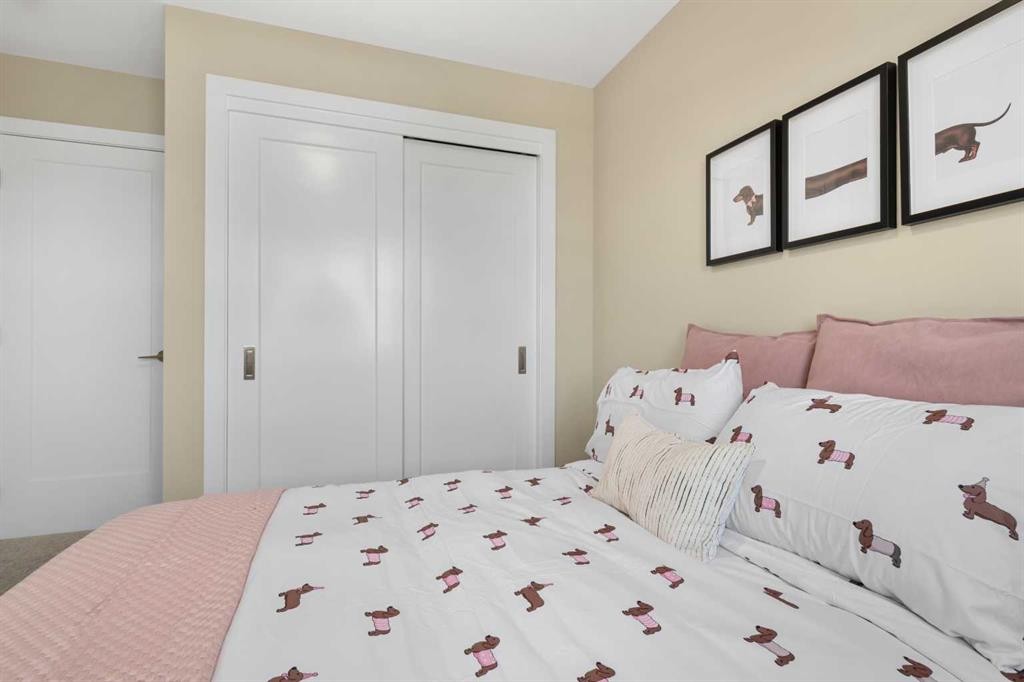 329 Flare Avenue Sw, Diamond Valley, AB - Indoor Photo Showing Bedroom
