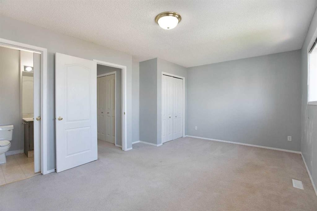 7269 Laguna Way Ne, Calgary, AB - Indoor Photo Showing Other Room