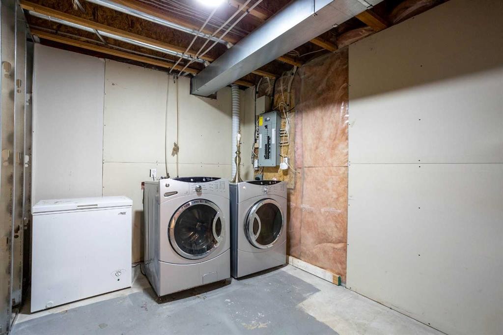 7269 Laguna Way Ne, Calgary, AB - Indoor Photo Showing Laundry Room