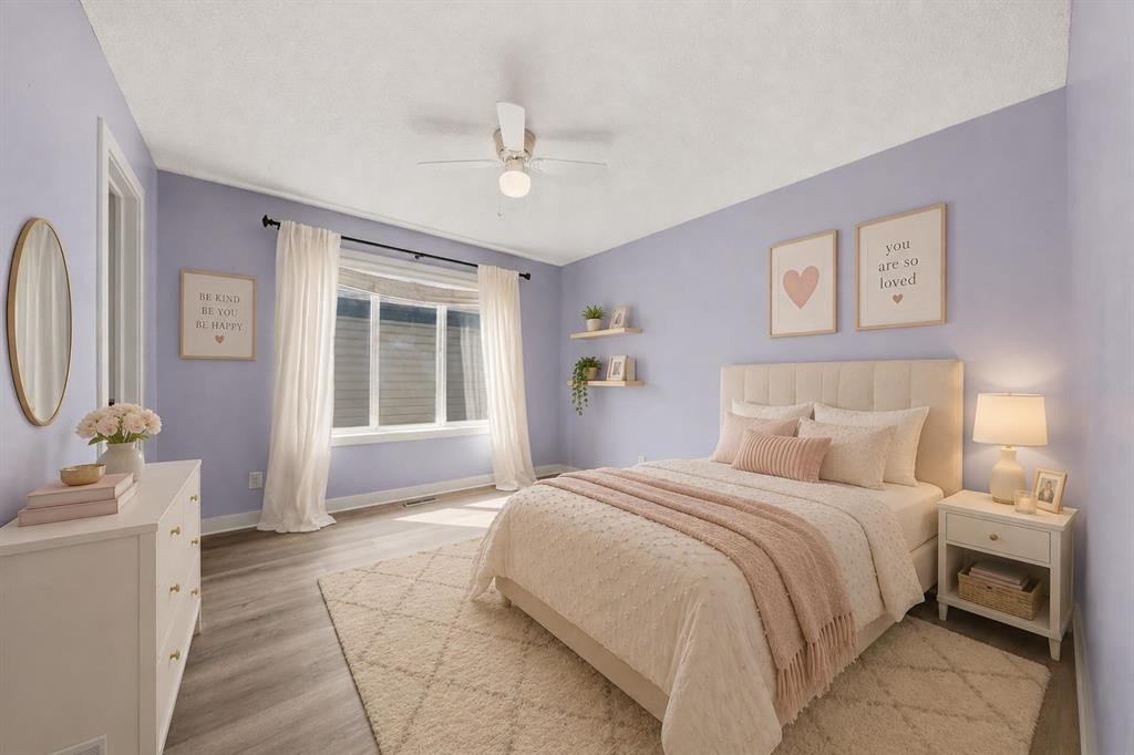 204 Eversyde Mews Sw, Calgary, AB - Indoor Photo Showing Bedroom