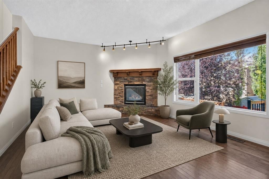 164 Aspenmere Close, Chestermere, AB - Indoor Photo Showing Living Room With Fireplace